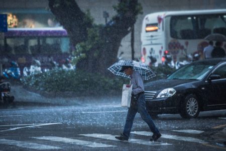 Some classes suspended as heavy rain lashes Macao