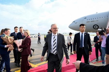 Australia’s prime minister is visiting China, seeking ‘status quo’ on trade