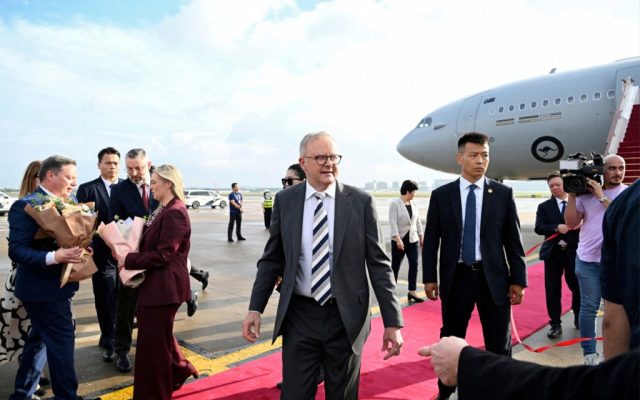 Australia’s prime minister is visiting China, seeking ‘status quo’ on trade