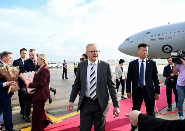 Australia’s prime minister is visiting China, seeking ‘status quo’ on trade