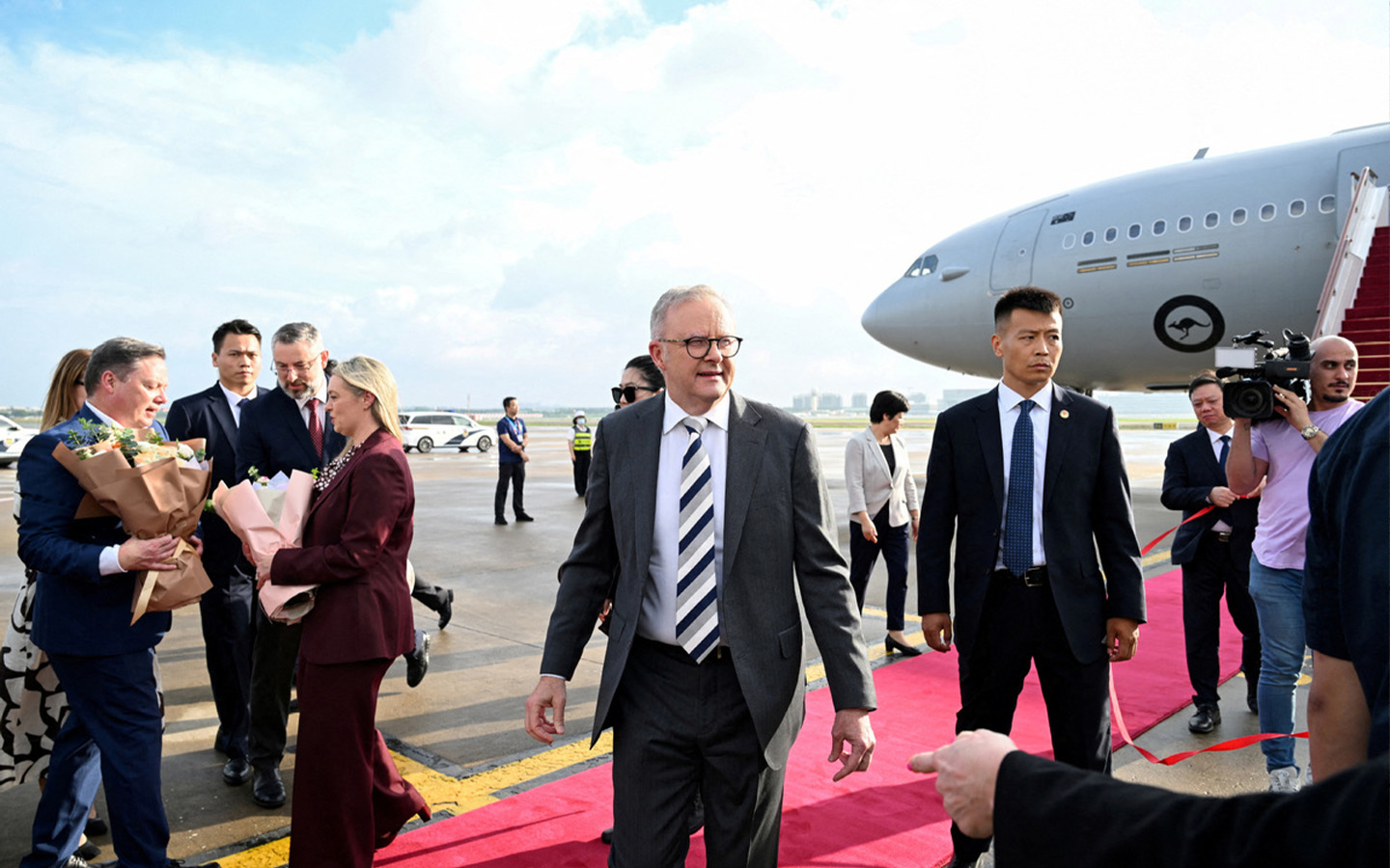 Australia’s prime minister is visiting China, seeking ‘status quo’ on trade