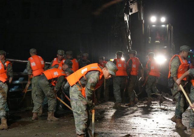 Drones and emergency teams deployed as rains continue to batter northern China