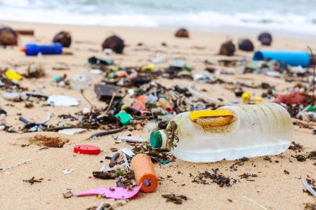 Rainfall and upstream flooding leave Macao’s coast swamped with rubbish