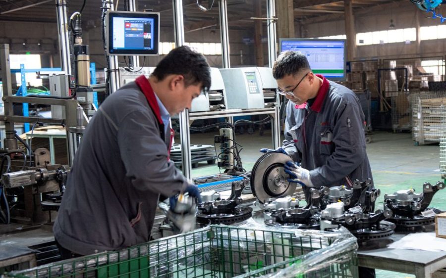 China’s manufacturing activity fell slightly last month, figures show