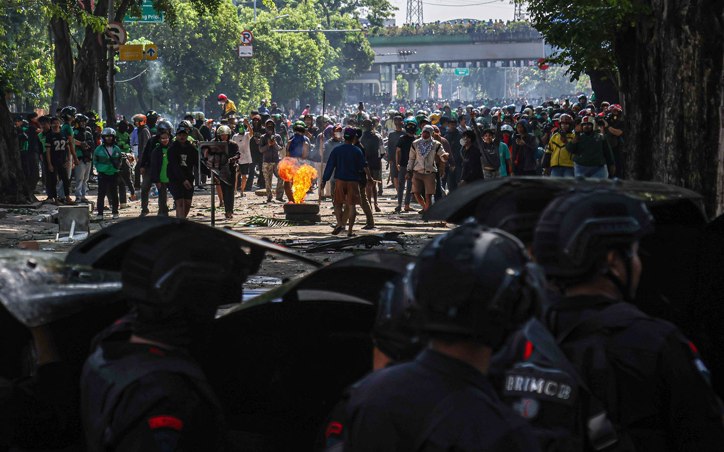Indonesia fires police officer over delivery driver’s death as massive protests rock Jakarta