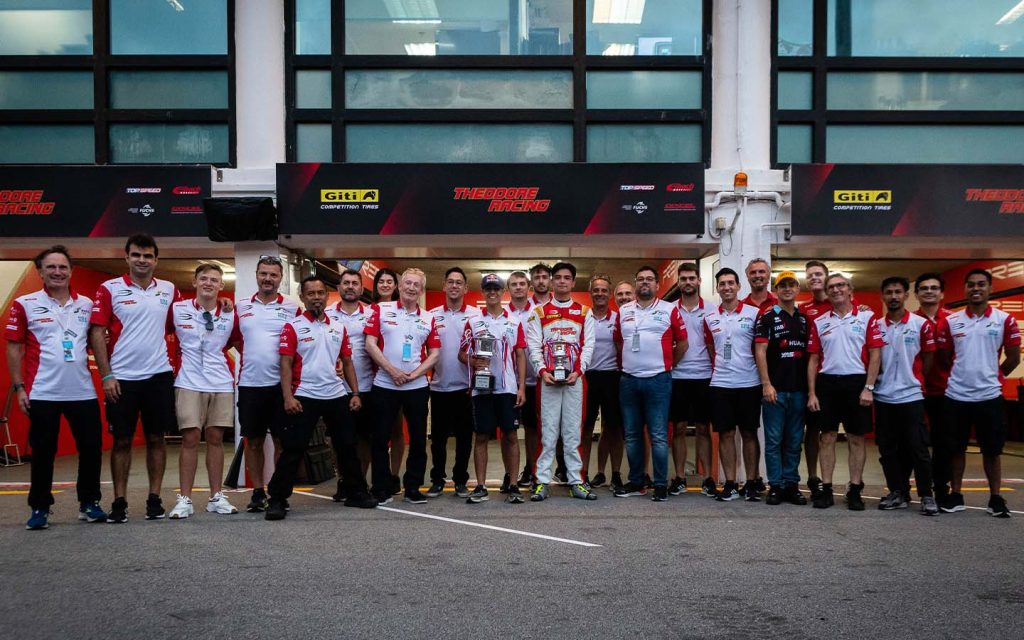 First and second place winners, Arvid Lindblad (Left centre) and Charles Leong (Right centre), pictured with the rest of the SJM Theodore Prema Racing team