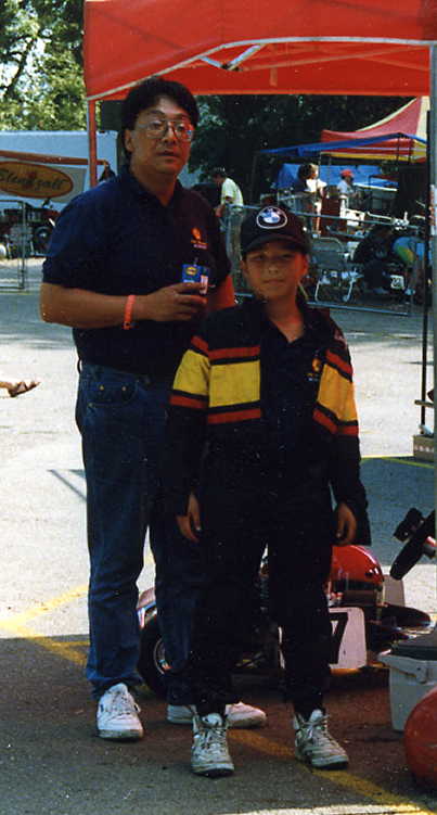 A young Darryl O’Young with his dad in 1991