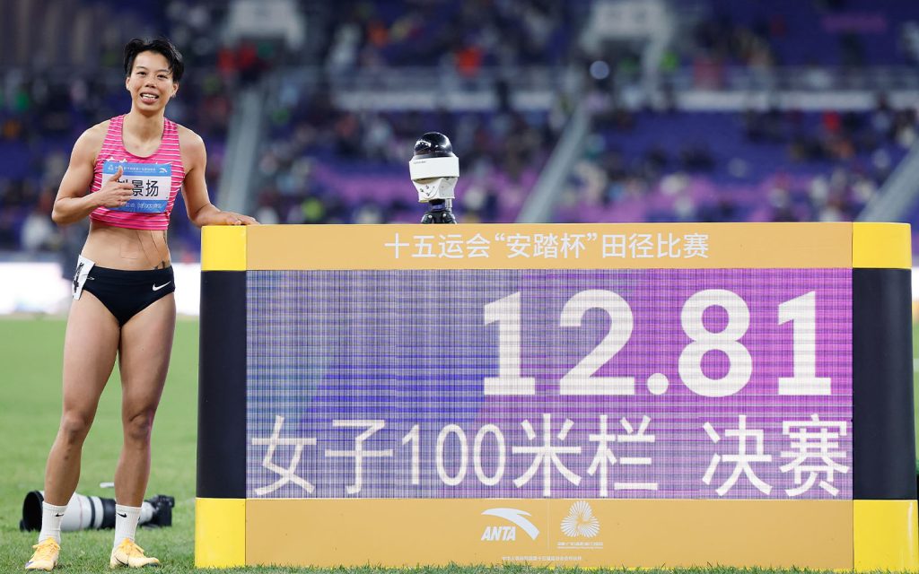 Liu Jingyang of Guangdong poses after winning the women’s 100m hurdles final of athletics at China’s 15th National Games yesterday
