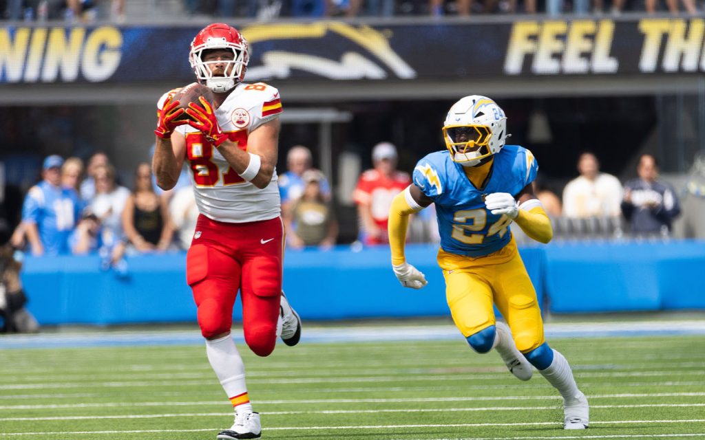 KC Chiefs tie end Travis Kelce #87 catches a pass next to LA Chargers safety AJ Finley #24 during an NFL football game last year