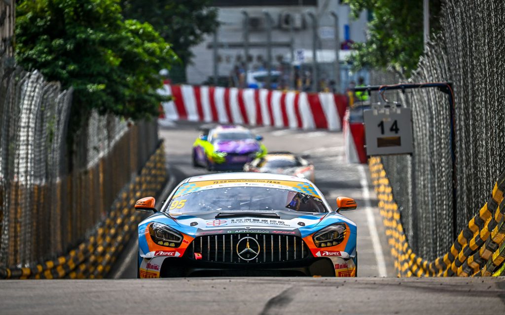 Second day chaos at the 72nd Macau Grand Prix - Darryl O'Young's #99 Mercedes-AMG GT3 charges through Turn 14 on Macao's Guia Circuit