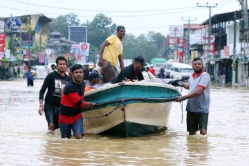 Sri Lanka braced for more rain as death toll in recent Asian floods exceeds 1,200