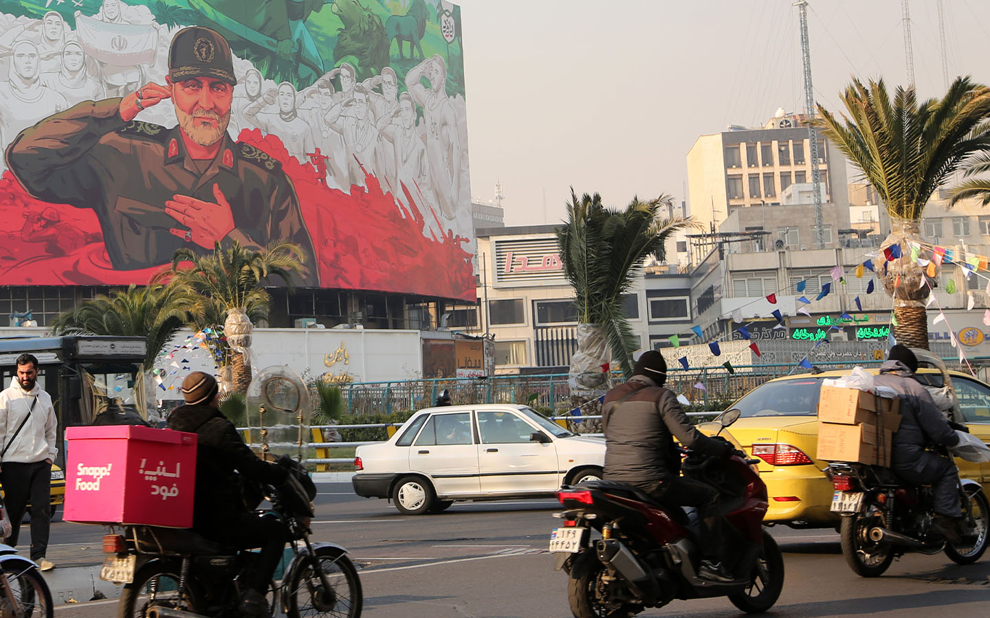 Iran claims protests ‘under total control’ as US tones down retaliation threats