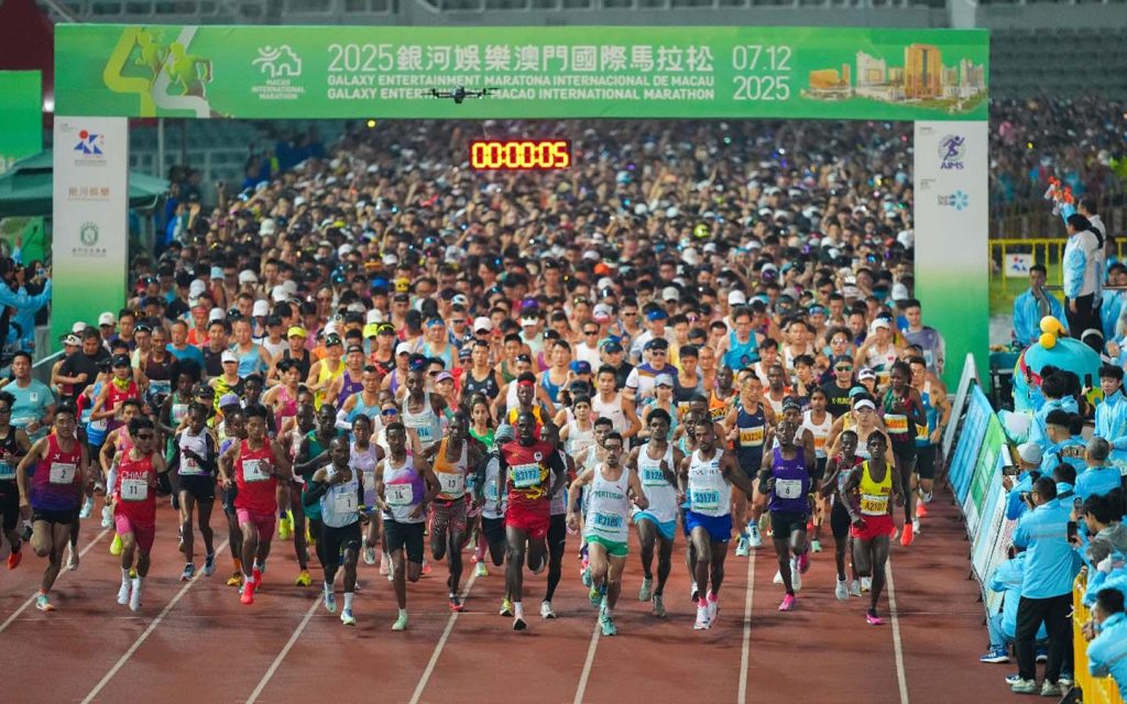 Runners pass Macao landmarks and cross iconic bridges at the Macao International Marathon