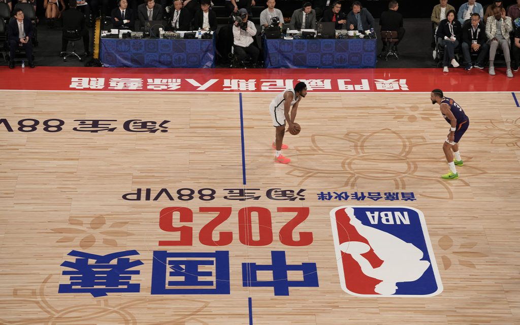 Brooklyn Nets guard Cam Thomas drives against Phoenix Suns forward Dillon Brooks during the NBA China Games in Macao