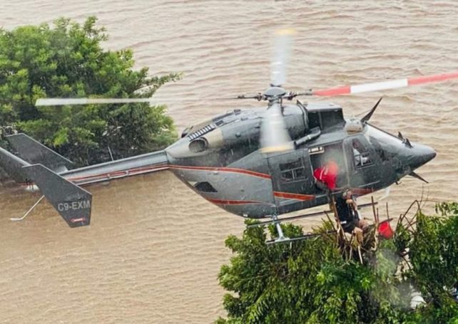 Flood waters inundate Mozambique, forcing thousands to flee