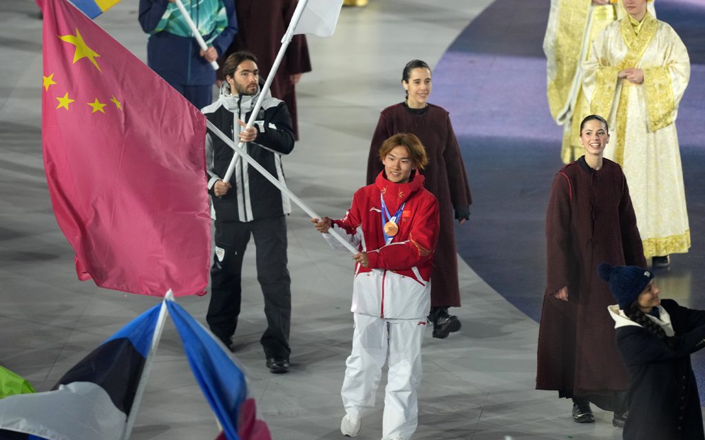 Gu Ailing and Wang Xindi lead China to five golds at Milano-Cortina 2026 - Su Yiming, flag bearer of the delegation of China, parades during the closing ceremony of the Milan-Cortina 2026 Olympic Winter Games at Verona Olympic Arena in Verona on 22 February 2026