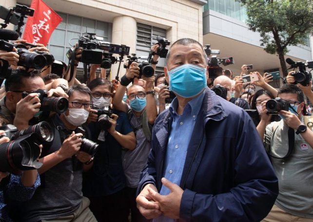 Hong Kong ex-tycoon Jimmy Lai sentenced to 20 years for endangering national security
