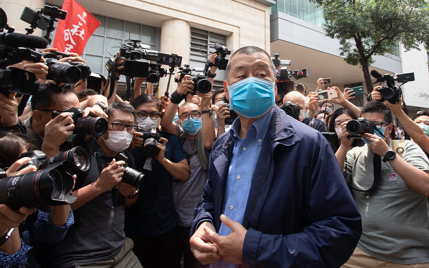 Hong Kong ex-tycoon Jimmy Lai sentenced to 20 years for endangering national security